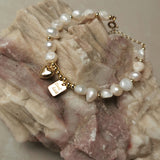Tashi Pearl Charm Bracelet