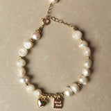 Tashi Pearl Charm Bracelet